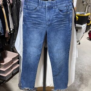 Women’s straight leg high rise frayed bottom jeans